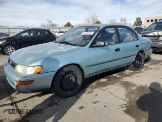 1994 Toyota Corolla Deluxe with VIN JT2AE09B4R0067104, listed as a Copart auction lot 83565064 with 207,923 mi miles and Salvage title. Bid and sale history available at DreamBid. Image 1.