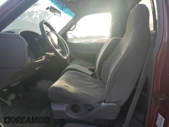 1999 Ford F-150 with VIN 1FTRF17W7XNA44872, listed as a Copart auction lot 41815695 with 182,678 mi miles and Salvage title. Bid and sale history available at DreamBid. Image 7.