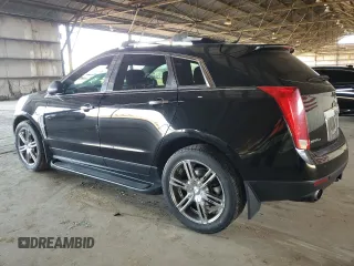 2012 Cadillac SRX Premium Collection z VIN 3GYFNFE30CS599863, wystawiony jako Copart lot #61249995 z przebiegiem 144 740 mil mil oraz Czysty tytuł • Clean title. Historia ofert i sprzedaży dostępna na DreamBid. Obrazek 2.