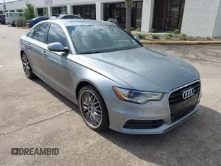 2013 Audi A6 3.0T Prestige with VIN WAUHGAFC4DN126258, listed as a IAAI auction lot 41512291 with 123,298 mi miles. Bid and sale history available at carsss.com. Image 1.