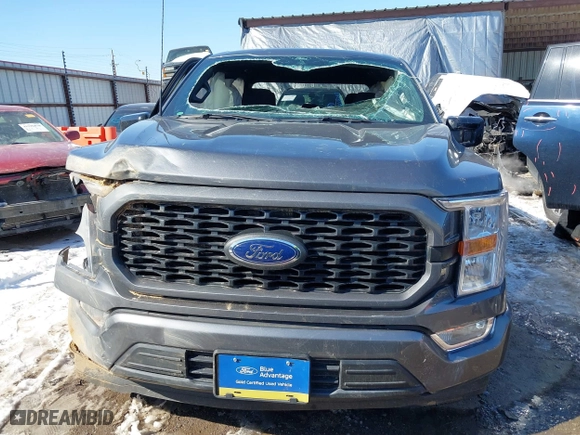 2021 Ford F-150 XL with VIN 1FTEW1C51MFC94173, listed as a IAAI auction lot 41628222 with 23,266 mi miles. Bid and sale history available at carsss.com. Image 13.