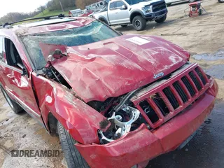 2010 Jeep Grand Cherokee Laredo with VIN 1J4PR4GK9AC143199, listed as a IAAI auction lot 41972153 with 81,896 mi miles. Bid and sale history available at carsss.com. Image 6.