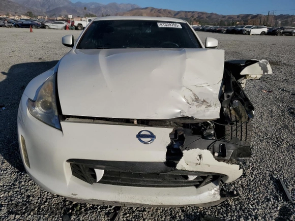 2014 Nissan 370Z Touring with VIN JN1AZ4EH7EM637101, listed as a Copart auction lot 41339705 with 105,841 mi miles and Salvage Title. Bid and sale history available at carsss.com. Image 5.