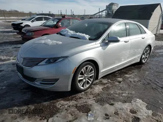 2014 Lincoln MKZ z VIN 3LN6L2G99ER825605, wystawiony jako IAAI lot #41296771 z przebiegiem 195 838 mil mil oraz . Historia ofert i sprzedaży dostępna na DreamBid. Obrazek 2.