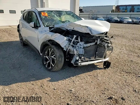 2021 Toyota C-HR LE z VIN NMTKHMBX2MR140040, wystawiony jako Copart lot #50598335 z przebiegiem Nie podano mil oraz Szkoda całkowita • Salvage title. Historia ofert i sprzedaży dostępna na DreamBid. Obrazek 12.