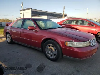1998 Cadillac Seville SLS z VIN 1G6KS54Y1WU933605, wystawiony jako Copart lot #74598874 z przebiegiem 220 398 mil mil oraz Szkoda całkowita • Salvage title. Historia ofert i sprzedaży dostępna na DreamBid. Obrazek 4.