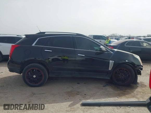 2013 Cadillac SRX z VIN 3GYFNAE3XDS654498, wystawiony jako IAAI lot #41740938 z przebiegiem 134 933 mil mil oraz . Historia ofert i sprzedaży dostępna na DreamBid. Obrazek 13.