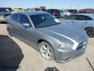 2013 Dodge Charger SE with VIN 2C3CDXBG4DH633448, listed as a IAAI auction lot 41784985 with 160,829 mi miles. Bid and sale history available at carsss.com. Image 1.