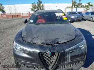 2022 Alfa Romeo Stelvio Ti with VIN ZASPAKBN5N7D24275, listed as a IAAI auction lot 41360975 with 24,668 mi miles. Bid and sale history available at carsss.com. Image 13.