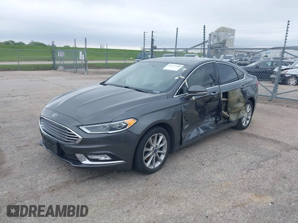 2017 Ford Fusion Energi SE with VIN 3FA6P0PU9HR227932, listed as a IAAI auction lot 42177500 with 106,938 mi miles. Bid and sale history available at carsss.com. Image 2.
