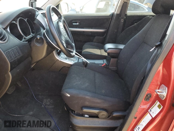 2012 Suzuki Grand Vitara Premium с VIN JS3TE0D62C4100130, выставлен на аукционе Copart как лот 48662145 с пробегом 81 557 миль миль и Списание • Salvage title. История ставок и продаж доступна на DreamBid. Изображение 7.