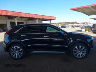 2023 Cadillac XT4 FWD Premium Luxury with VIN 1GYFZCR49PF173489, listed as a IAAI auction lot 41332451 with 10,227 mi miles and . Bid and sale history available at DreamBid. Image 14.