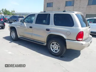 2003 Dodge Durango SLT z VIN 1D4HS48N43F517701, wystawiony jako IAAI lot #42277135 z przebiegiem 135 521 mil mil oraz . Historia ofert i sprzedaży dostępna na DreamBid. Obrazek 3.