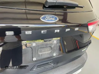 2020 Ford Escape SEL z VIN 1FMCU9H69LUA59992, wystawiony jako IAAI lot #42797223 z przebiegiem 87 913 mil mil oraz . Historia ofert i sprzedaży dostępna na DreamBid. Obrazek 13.