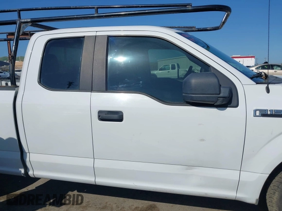 2015 Ford F-150 XL with VIN 1FTEX1C89FFC78555, listed as a IAAI auction lot 41989102 with 216,655 mi miles. Bid and sale history available at carsss.com. Image 13.