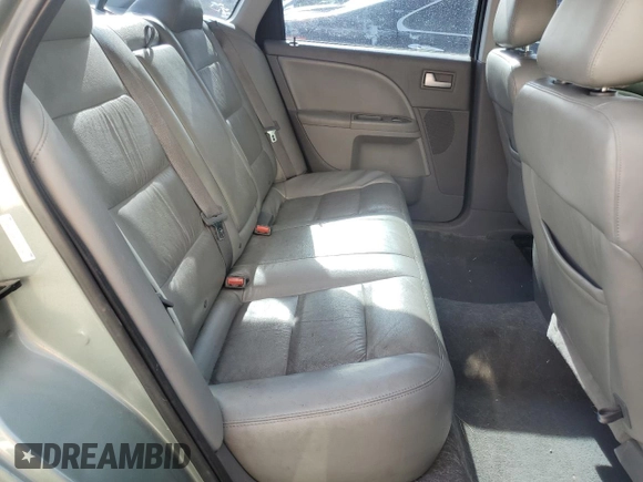2007 Ford Five Hundred SEL z VIN 1FAHP24197G143131, wystawiony jako Copart lot #54249095 z przebiegiem 153 305 mil mil oraz Czysty tytuł • Clean title. Historia ofert i sprzedaży dostępna na DreamBid. Obrazek 10.