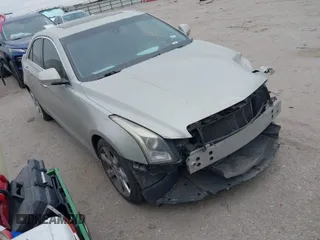 2014 Cadillac ATS Luxury RWD with VIN 1G6AB5RX1E0145568, listed as a IAAI auction lot 41548100 with 127,042 mi miles. Bid and sale history available at carsss.com. Image 1.