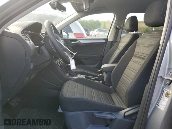 2023 Volkswagen Tiguan S with VIN 3VVFB7AX0PM086699, listed as a Copart auction lot 62885184 with 5,694 mi miles and Salvage title. Bid and sale history available at DreamBid. Image 7.