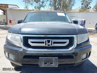 2011 Honda Ridgeline RTL with VIN 5FPYK1F50BB001442, listed as a IAAI auction lot 42023615 with 189,170 mi miles. Bid and sale history available at carsss.com. Image 12.