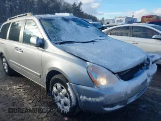 2006 Kia Sedona LX with VIN KNDMB233266063541, listed as a IAAI auction lot 41355689 with 165,451 mi miles. Bid and sale history available at carsss.com. Image 1.