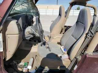 2002 Jeep Wrangler Sahara with VIN 1J4FA59S72P706380, listed as a Copart auction lot 56365355 with 282,467 mi miles and Clean title. Bid and sale history available at DreamBid. Image 7.