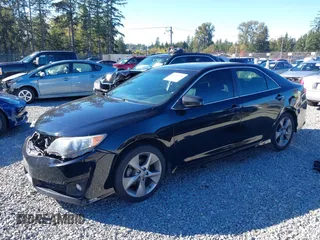 2014 Toyota Camry L with VIN 4T1BF1FK0EU732209, listed as a IAAI auction lot 40424721 with 200,271 mi miles. Bid and sale history available at carsss.com. Image 2.