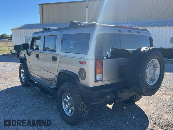 2003 Hummer H2 with VIN 5GRGN23U63H104992, listed as a Copart auction lot 79843444 with 181,468 mi miles and Clean Title. Bid and sale history available at carsss.com. Image 3.