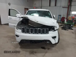 2020 Jeep Grand Cherokee Altitude with VIN 1C4RJFAG9LC344304, listed as a IAAI auction lot 41035821 with 61,723 mi miles and . Bid and sale history available at DreamBid. Image 12.