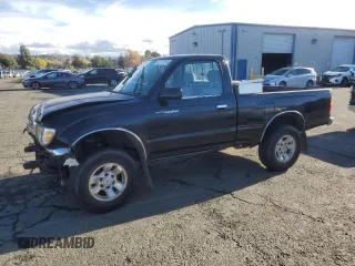 2000 Toyota Tacoma PreRunner with VIN 4TANM92N1YZ677732, listed as a Copart auction lot 82377674 with 227,125 mi miles and Salvage title. Bid and sale history available at DreamBid. Image 1.