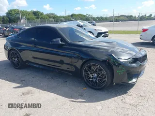 2018 BMW M4 with VIN WBS4Y9C52JAA85873, listed as a IAAI auction lot 41590207 with 58,947 mi miles. Bid and sale history available at carsss.com. Image 1.