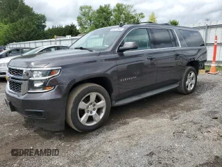 2015 Chevrolet Suburban LT with VIN 1GNSKJKC7FR308777, listed as a Copart auction lot 58213995 with 162,480 mi miles and Salvage title. Bid and sale history available at DreamBid. Image 1.