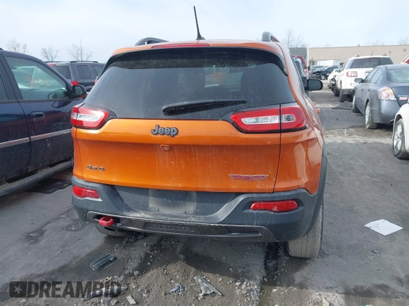 2015 Jeep Cherokee Trailhawk with VIN 1C4PJMBB3FW642266, listed as a IAAI auction lot 41510571 with 72,030 mi miles and . Bid and sale history available at DreamBid. Image 16.