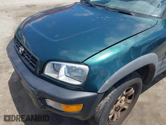 1998 Toyota RAV4 with VIN JT3GP10V6W0023680, listed as a IAAI auction lot 42235877 with 244,446 mi miles and . Bid and sale history available at DreamBid. Image 6.