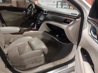 2013 Cadillac XTS Luxury with VIN 2G61R5S37D9152726, listed as a IAAI auction lot 41718331 with 88,189 mi miles and . Bid and sale history available at DreamBid. Image 5.