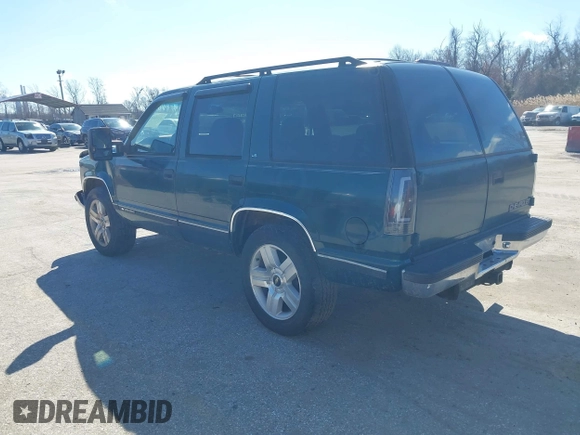 1999 Chevrolet Tahoe Z71 z VIN 1GNEK13R2XJ325602, wystawiony jako IAAI lot #41590107 z przebiegiem 204 611 mil mil oraz . Historia ofert i sprzedaży dostępna na DreamBid. Obrazek 3.