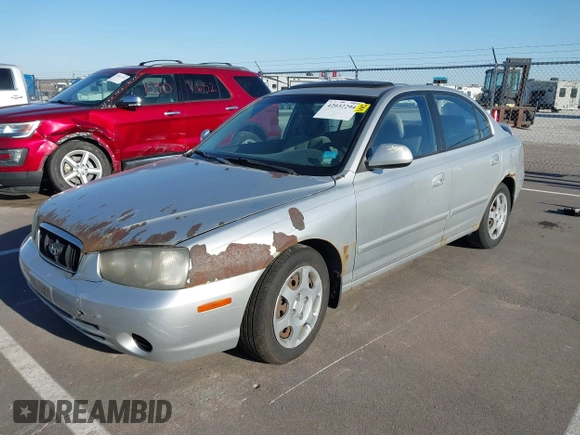 2003 Hyundai Elantra GLS z VIN KMHDN45D63U553542, wystawiony jako IAAI lot #42032294 z przebiegiem 164 210 mil mil oraz . Historia ofert i sprzedaży dostępna na DreamBid. Obrazek 2.