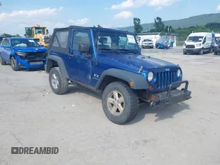 2009 Jeep Wrangler X z VIN 1J4FA24109L727084, wystawiony jako IAAI lot #42792207 z przebiegiem 140 172 mil mil oraz . Historia ofert i sprzedaży dostępna na DreamBid. Obrazek 1.