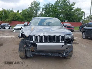 2020 Jeep Grand Cherokee Altitude with VIN 1C4RJFAG2LC241483, listed as a IAAI auction lot 42466089 with 68,638 mi miles and . Bid and sale history available at DreamBid. Image 12.