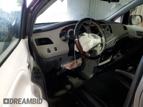 2011 Toyota Sienna SE with VIN 5TDXK3DCXBS159705, listed as a Copart auction lot 52173115 with 134,100 mi miles and Salvage Title. Bid and sale history available at carsss.com. Image 8.