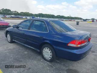 2002 Honda Accord LX with VIN JHMCG56482C014034, listed as a IAAI auction lot 42110164 with 95,657 mi miles and . Bid and sale history available at DreamBid. Image 3.