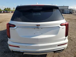 2023 Cadillac XT6 FWD Premium Luxury with VIN 1GYKPCRS5PZ120905, listed as a Copart auction lot 64374254 with 30,694 mi miles and Salvage title. Bid and sale history available at DreamBid. Image 6.