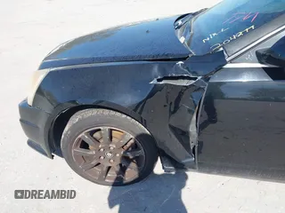 2008 Cadillac CTS RWD with VIN 1G6DP57V880204877, listed as a IAAI auction lot 41654282 with 165,948 mi miles and . Bid and sale history available at DreamBid. Image 6.