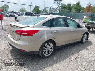 2018 Ford Focus Titanium с VIN 1FADP3J27JL279628, выставлен на аукционе IAAI как лот 42139356 с пробегом 108 007 миль миль и . История ставок и продаж доступна на DreamBid. Изображение 4.