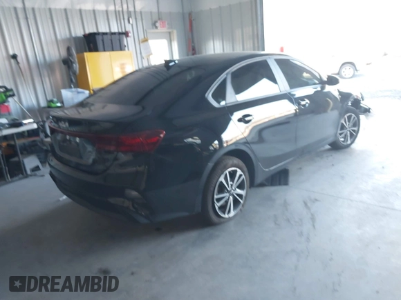 2023 Kia Forte LXS with VIN 3KPF24AD9PE618822, listed as a IAAI auction lot 41296769 with 31,699 mi miles. Bid and sale history available at carsss.com. Image 4.