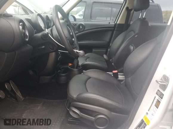 2014 MINI Countryman S z VIN WMWZC3C57EWP51864, wystawiony jako Copart lot #71233944 z przebiegiem 73 828 mil mil oraz Szkoda całkowita • Salvage title. Historia ofert i sprzedaży dostępna na DreamBid. Obrazek 7.