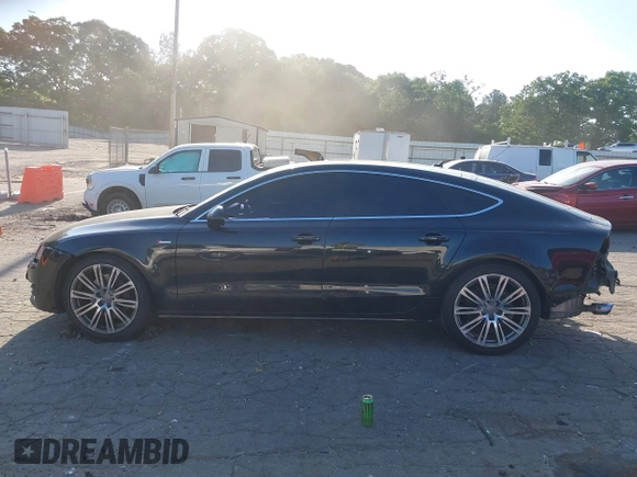 2014 Audi A7 Premium Plus z VIN WAUWGAFC4EN092525, wystawiony jako IAAI lot #42331183 z przebiegiem 183 258 mil mil oraz . Historia ofert i sprzedaży dostępna na DreamBid. Obrazek 14.