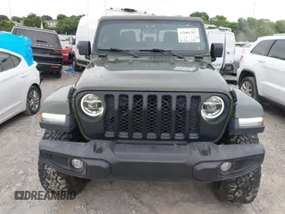 2022 Jeep Gladiator Texas Trail z VIN 1C6HJTAG1NL105124, wystawiony jako IAAI lot #42601707 z przebiegiem 52 064 mil mil oraz . Historia ofert i sprzedaży dostępna na DreamBid. Obrazek 12.