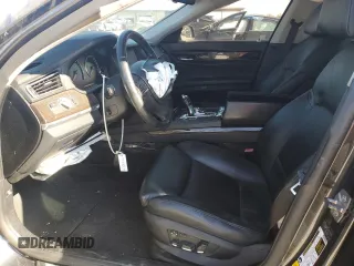 2011 BMW 7 Series 740i with VIN WBAKA4C57BC612487, listed as a Copart auction lot 82633554 with 0 mi miles and Salvage Title. Bid and sale history available at carsss.com. Image 7.