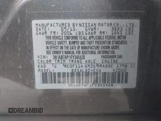 2015 Nissan Sentra S with VIN 3N1AB7AP1FY345428, listed as a IAAI auction lot 42044857 with 113,046 mi miles. Bid and sale history available at carsss.com. Image 9.