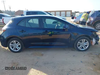 2021 Toyota Corolla Hatchback SE with VIN JTND4MBE9M3114388, listed as a IAAI auction lot 41796303 with 58,656 mi miles. Bid and sale history available at carsss.com. Image 13.